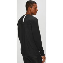 Calvin Klein Performance - Longsleeve. Czarne koszulki męskie z długim rękawem Calvin Klein Performance, z dzianiny, z okrągłym kołnierzem, z długim rękawem. Za 199.90 zł.