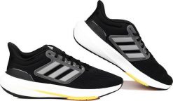 Adidas Buty męskie do biegania adidas Ultrabounce czarno-szare HP5777 40 2/3. Czarne buty do biegania męskie ADIDAS, bez wzorów, bez zapięcia, do biegania. Za 352.81 zł.